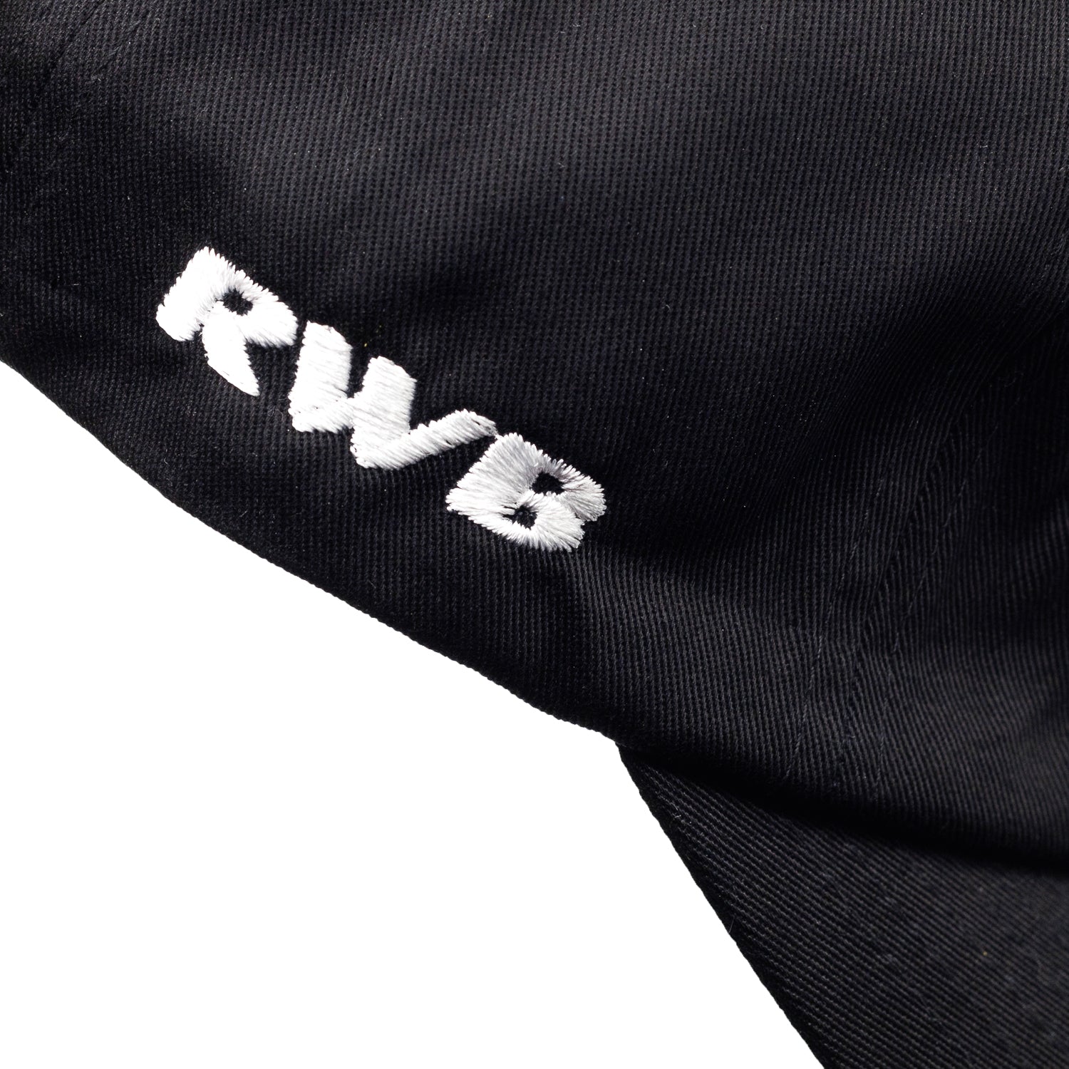Hoonigan x RWB ROUGH WORLD KILL ALL TIRES unstructured strapback hat in black with white embroidered logo on front.
