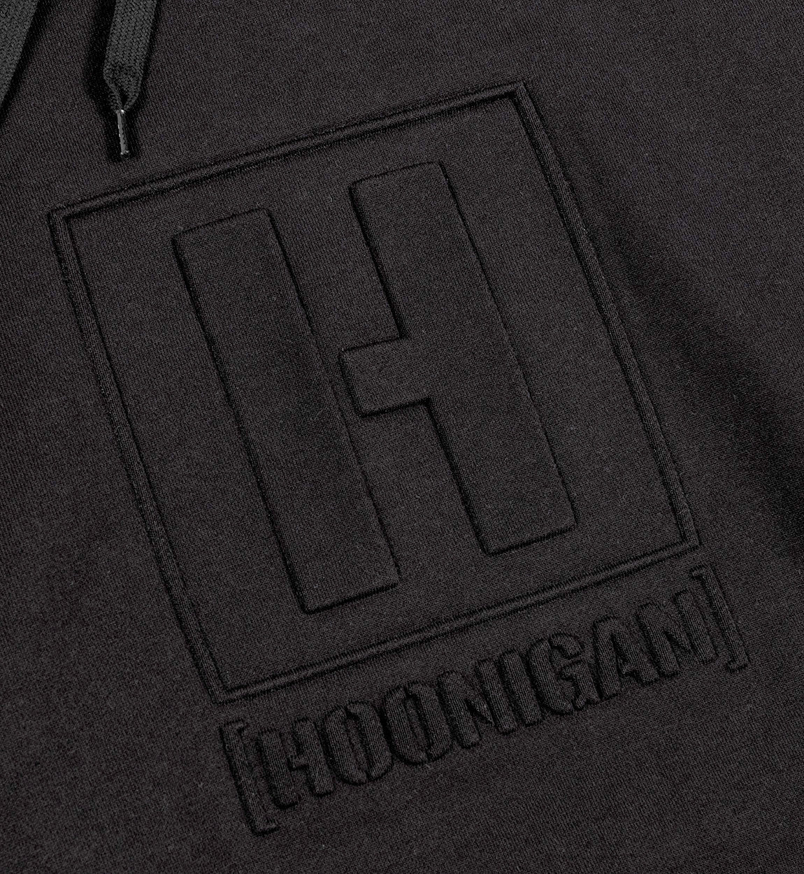 Hoonigan EMBOSSED H-BOX Hoodie in black with embossed logo on the chest, featuring a drawstring hood and kangaroo pocket.