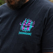 Black short sleeve Hoonigan TREADWEAR t-shirt featuring a vibrant graphic of a steering wheel and flames.