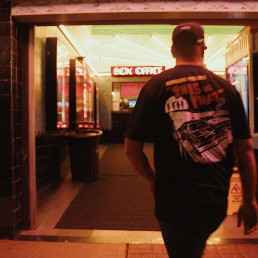 Hoonigan DOUBLE FEATURE Short Sleeve Tee featuring a bold graphic design on a black background.