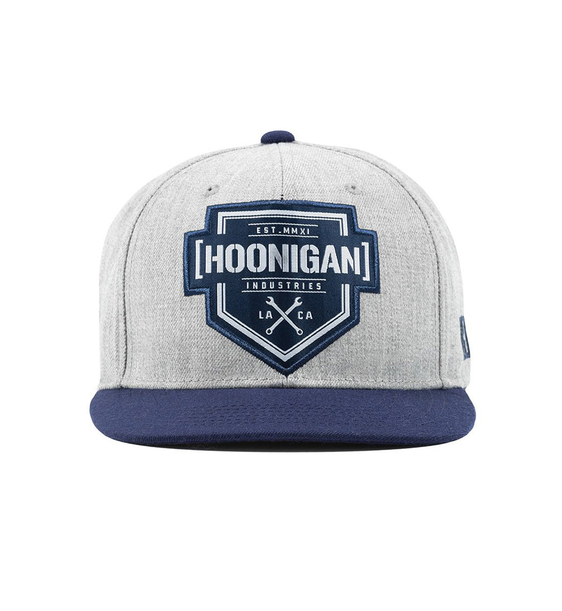 Hoonigan BRACKET X LOGO Snapback Hat in black with white logo detail on the front, featuring an adjustable strap and flat brim design.