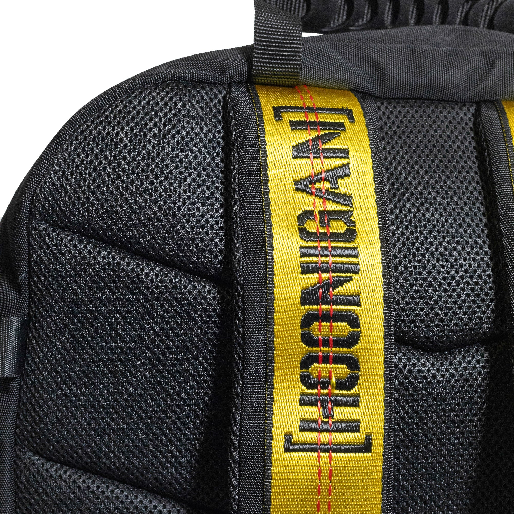 Hoonigan RATCHET STRAP Backpack featuring a bold design with adjustable ratchet straps, multiple compartments, and a durable fabric.