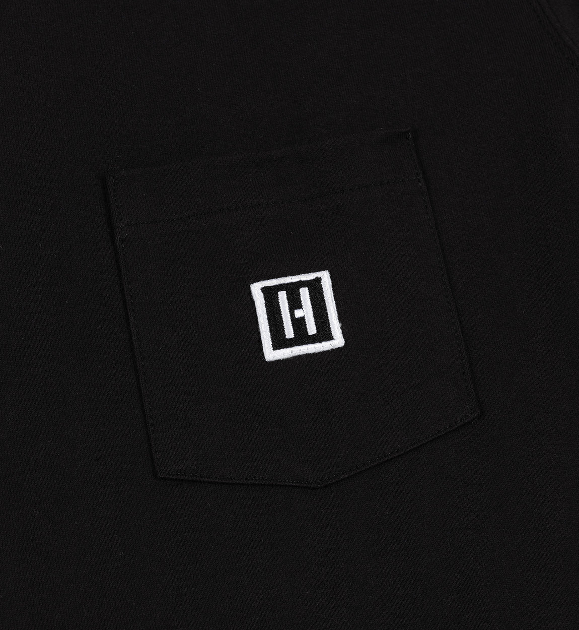 Hoonigan H-ICON Premium long sleeve tee shirt in black, featuring a bold white logo on the chest and graphic designs on the sleeves.