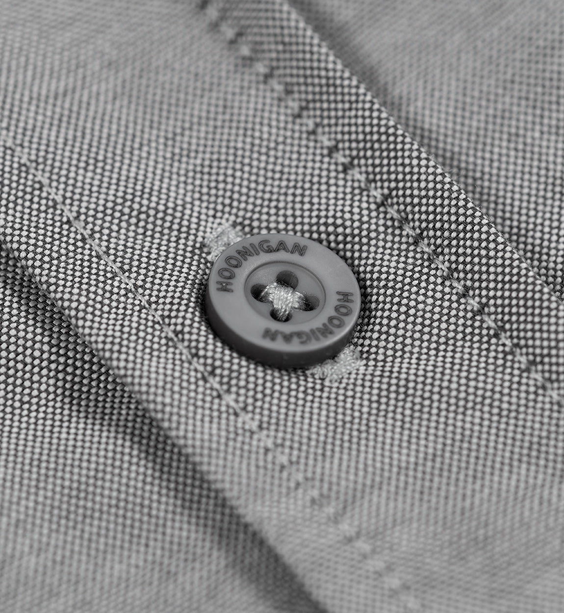 Hoonigan DONUT GARAGE woven short sleeve button-up shirt in heather gray with a logo print.