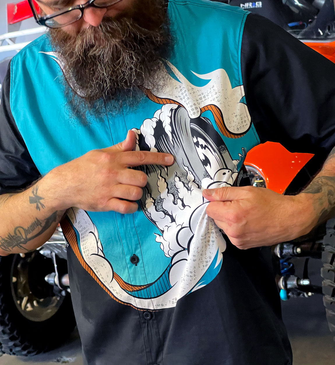 Hoonigan WAVE OF MUTILATION black woven short sleeve button-up shirt with vibrant graphic design.