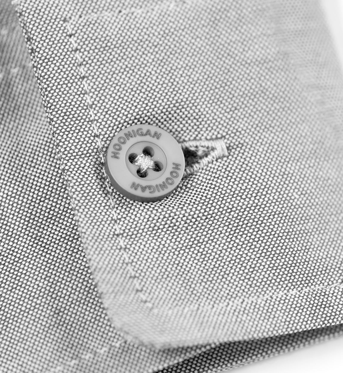 Hoonigan DONUT GARAGE woven long sleeve button-up shirt in heather gray with logo details.