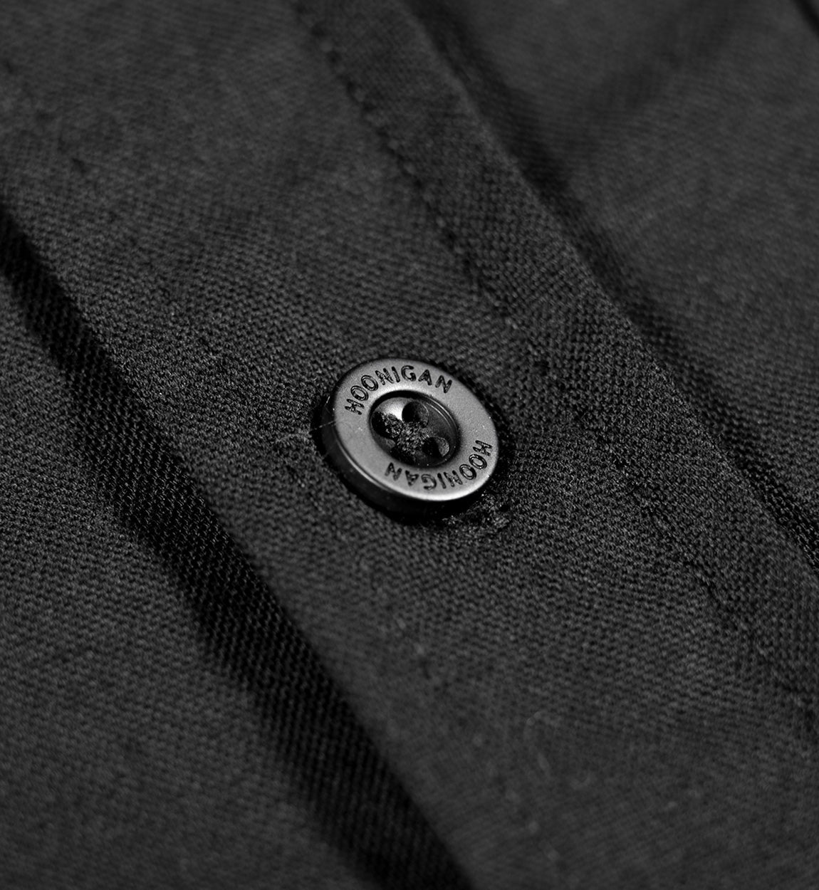 Hoonigan DONUT GARAGE black woven short sleeve button-up shirt with unique graphic design.