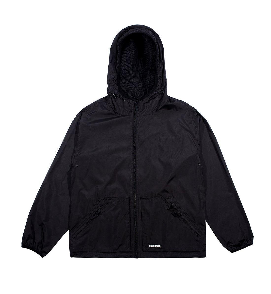 Hoonigan STANDARD ISSUE Windbreaker Jacket in black and white, featuring a bold logo on the front, zip closure, and adjustable hood.