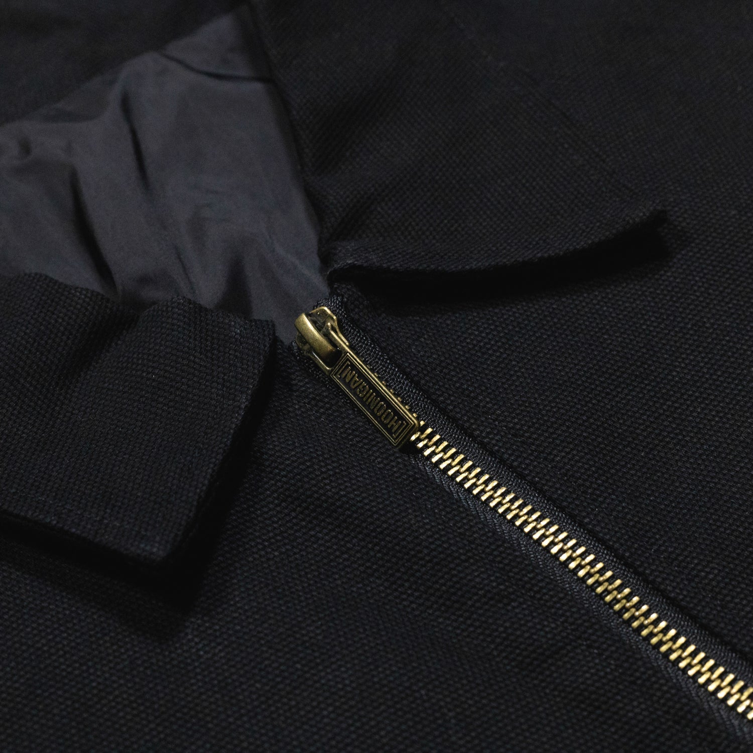 Hoonigan KNUCKLEBUSTERS Jacket featuring a bold graphic design and durable fabric, perfect for motorsport enthusiasts.