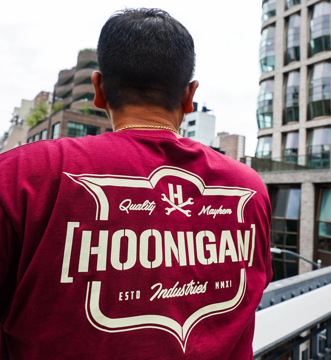Hoonigan EMBLEM Short Sleeve Tee in burgundy with a bold graphic logo on the front.