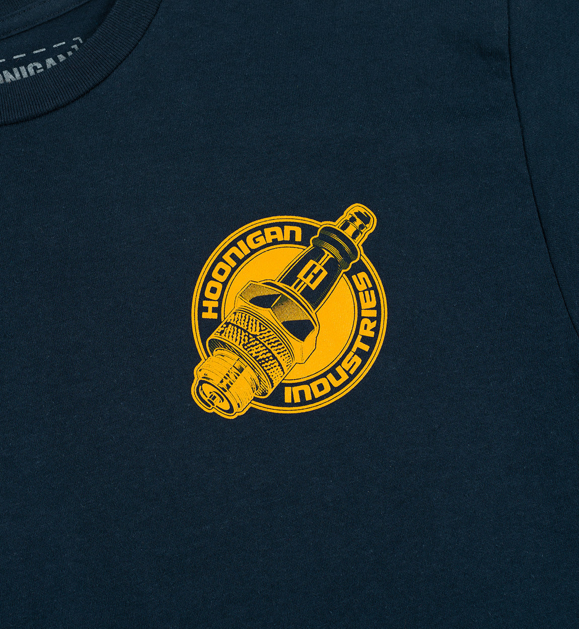 Hoonigan MISFIRE Short Sleeve Tee in navy blue featuring bold graphic design and logo on the front.
