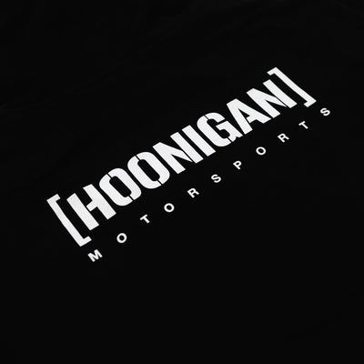 Black Hoonigan Motorsports pullover hoodie featuring a large logo graphic on the back and a front kangaroo pocket.