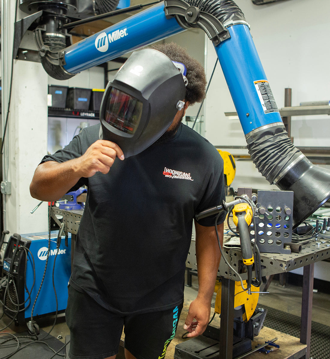 Black short sleeve tee featuring "Hoonigan FOREVER MIDNIGHT" graphic on the front, designed for a stylish, casual look.