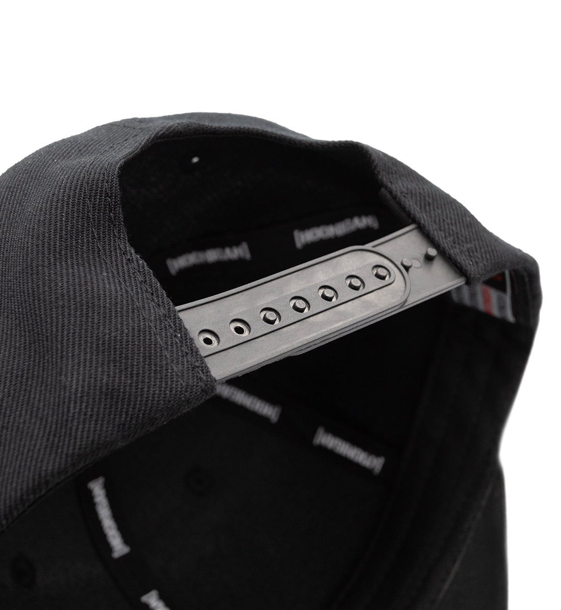 Hoonigan TIRE SLAYER Snapback Hat in black with white logo and adjustable strap.