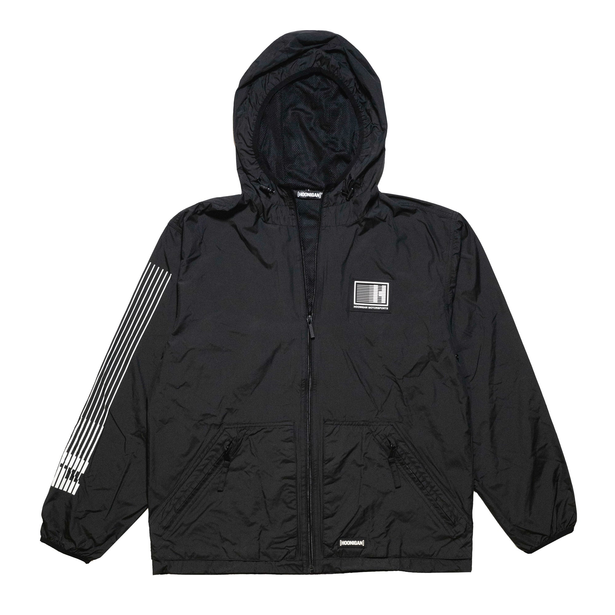 Black Hoonigan Motorsports windbreaker jacket featuring a full zip, adjustable hood, and bold logo on the front.