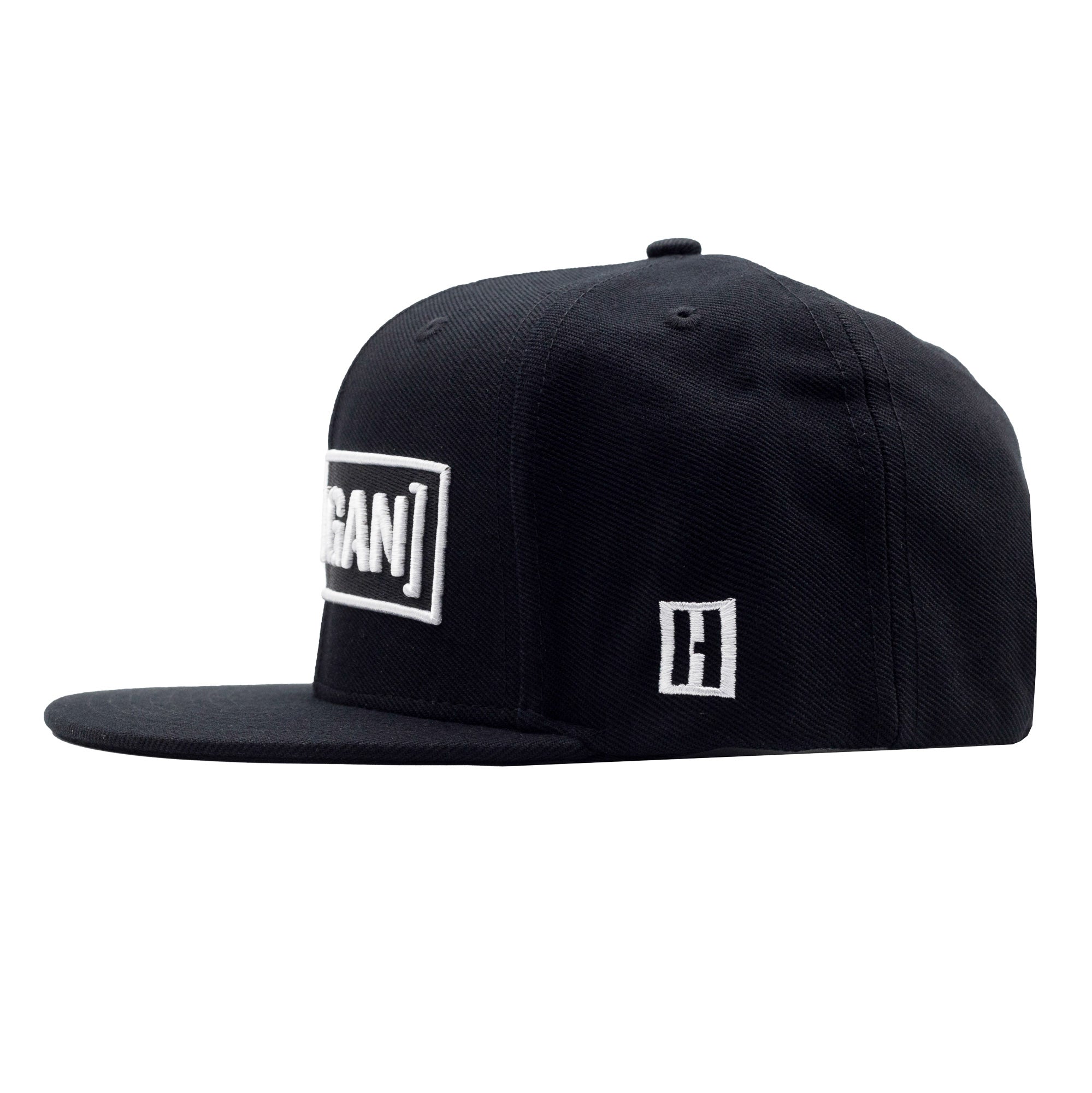 Black snapback hat featuring a bold white Hoonigan logo on the front and a small emblem on the side.