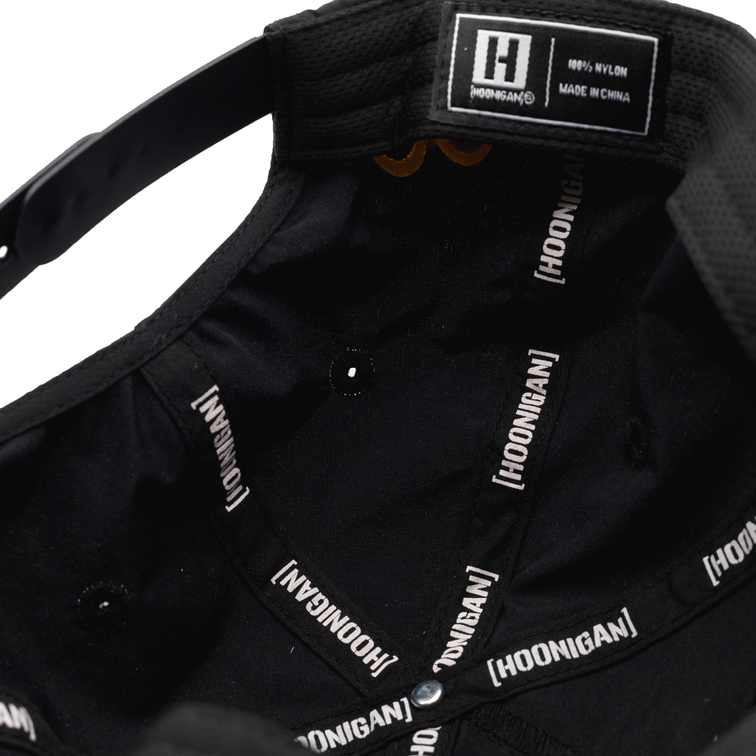 Hoonigan x Mooneyes decorated unstructured snapback hat featuring a graphic logo on the front and a black color scheme.