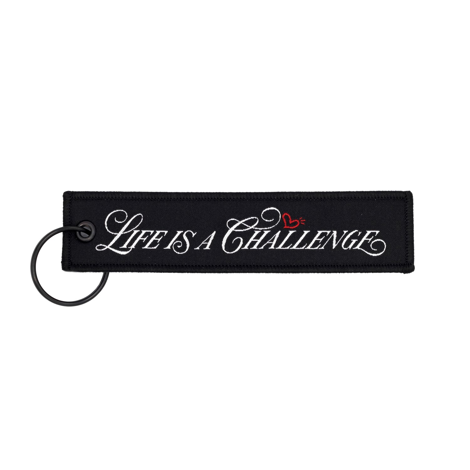 Hoonigan x Sayaka LIFE IS A CHALLENGE Jet Tag Keychain featuring bold graphics on a vibrant background.