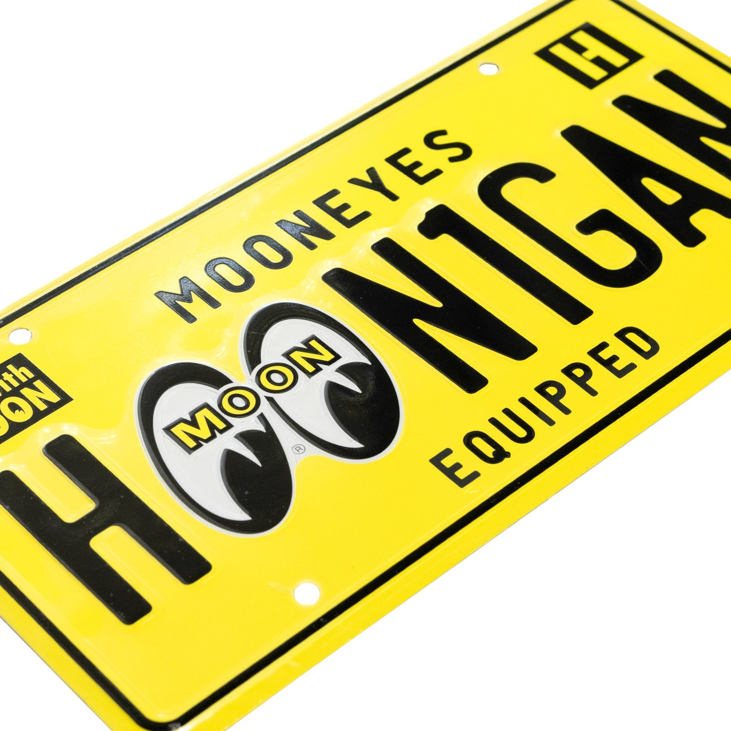 Hoonigan x Mooneyes EQUIPPED license plate featuring bold black lettering on a vibrant yellow background.