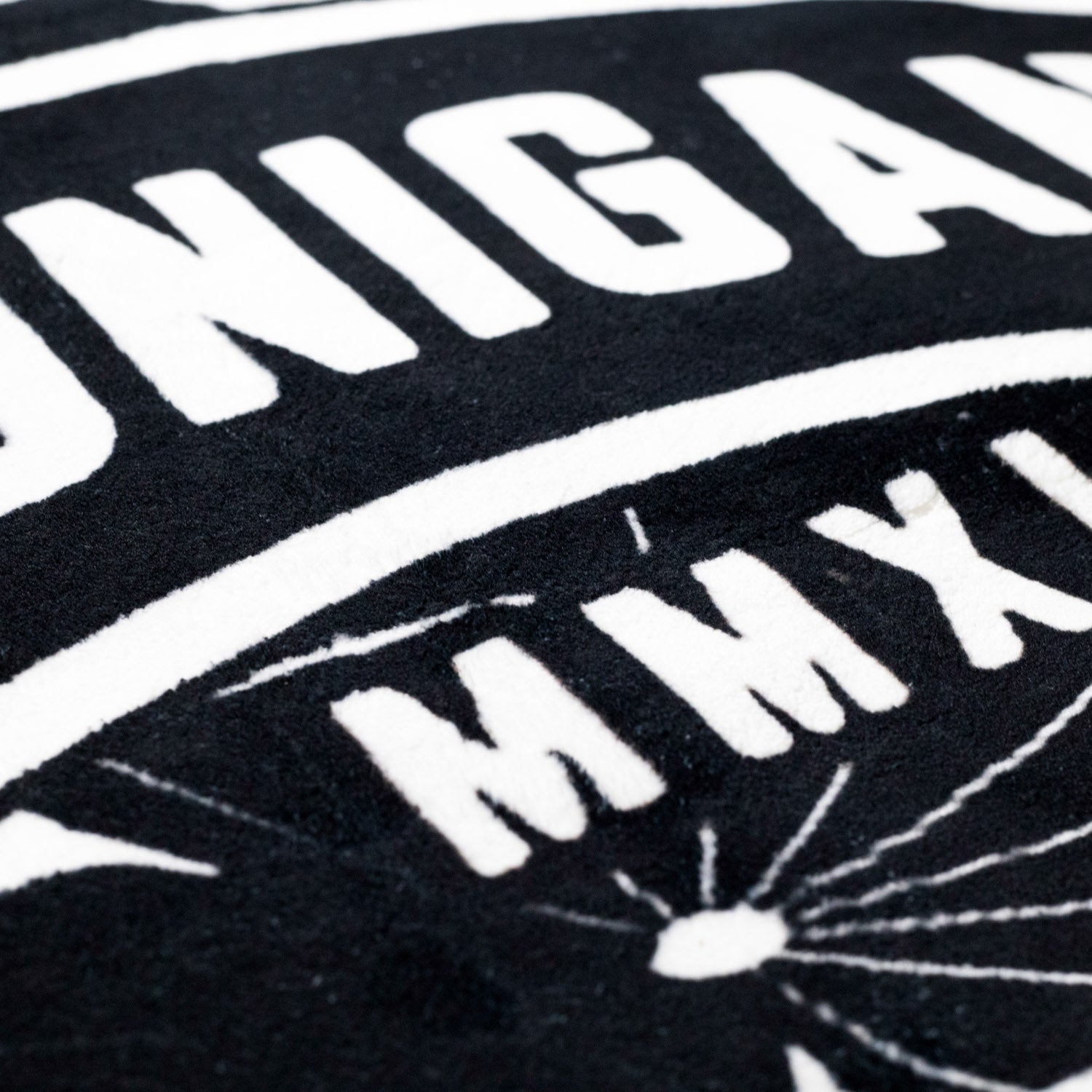 Hoonigan WORLDWIDE Rug (3.75') featuring bold graphics and a sleek design, ideal for automotive enthusiasts.