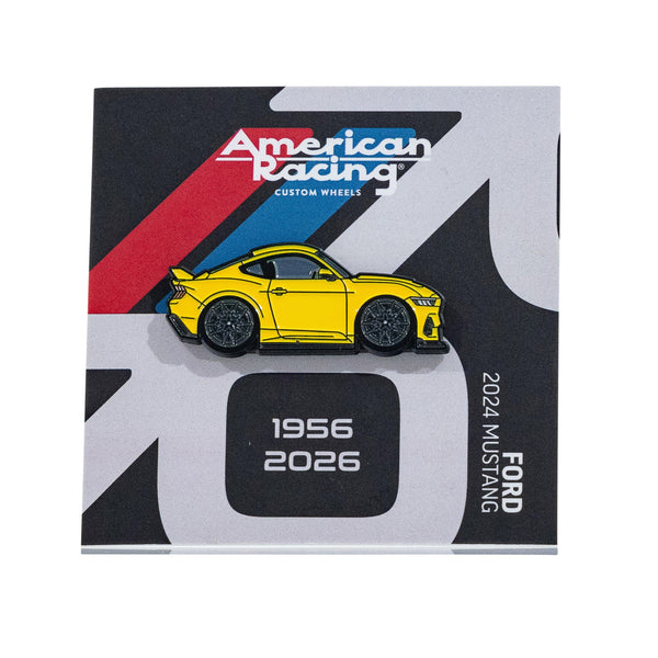 Yellow Ford Mustang collectible pin by American Racing, featuring a sleek design and commemorating 1956 to 2026.