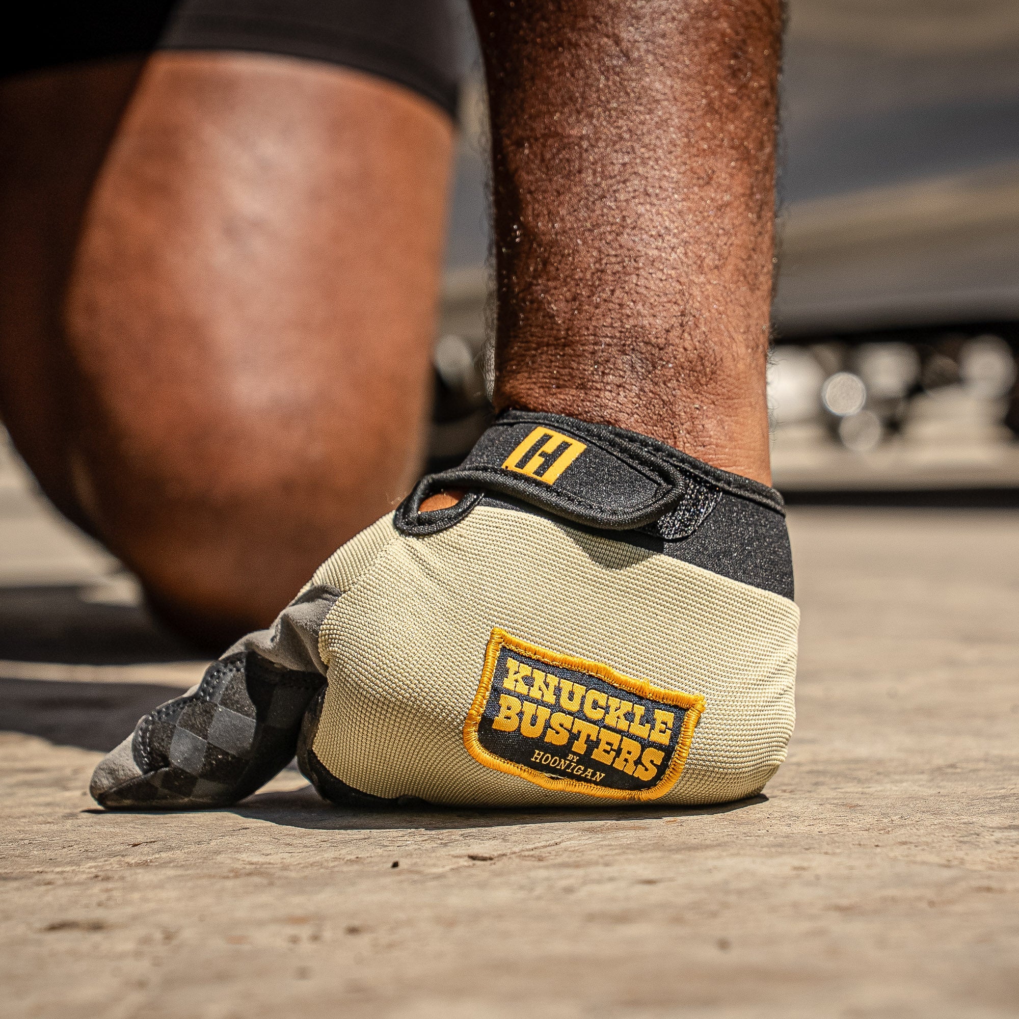 Hoonigan Knucklebusters gloves feature a durable design with a bold logo, ideal for motorsport enthusiasts and aggressive driving.