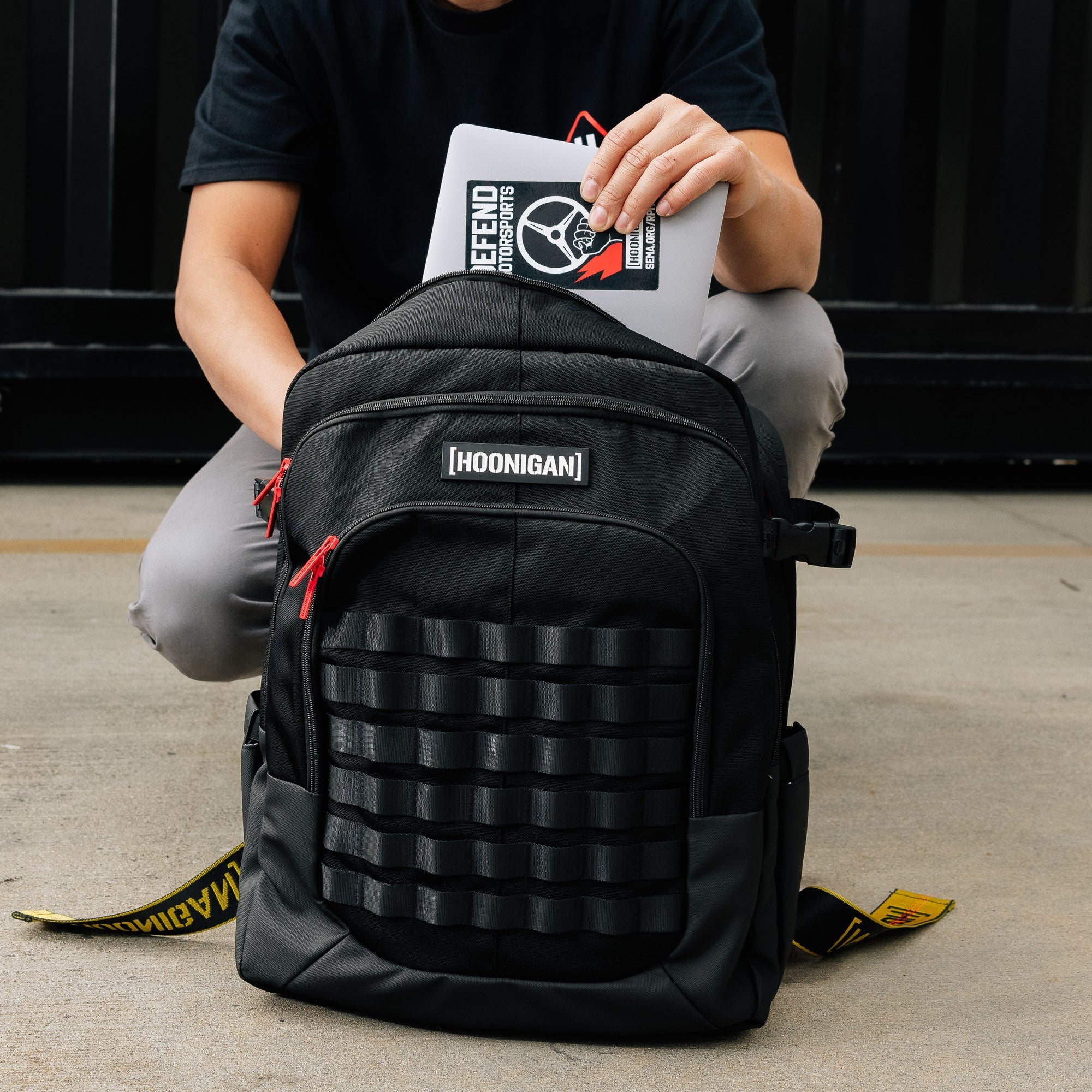 Hoonigan RATCHET STRAP Backpack featuring a durable design with adjustable strap system and bold Hoonigan branding.