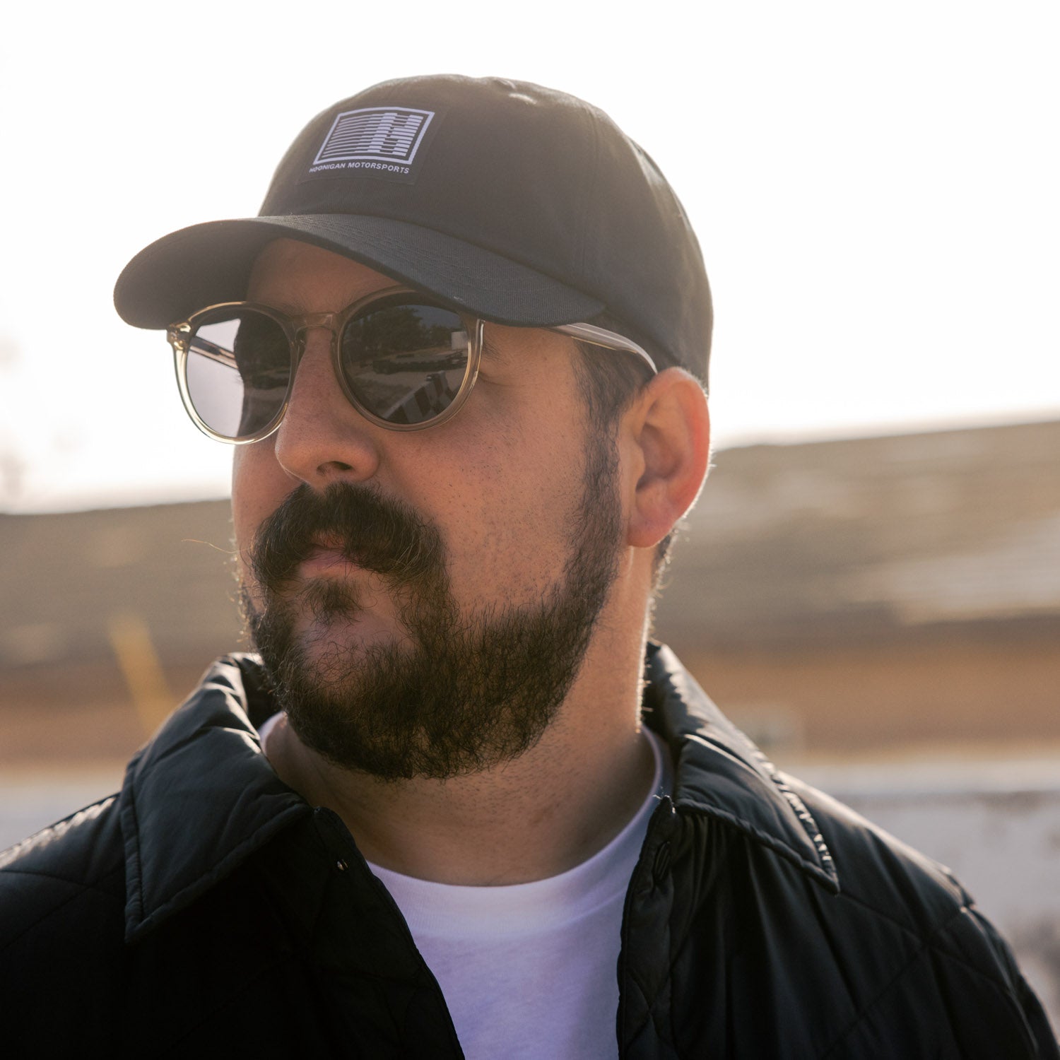 Hoonigan Motorsports unstructured dad hat in black with white logo.