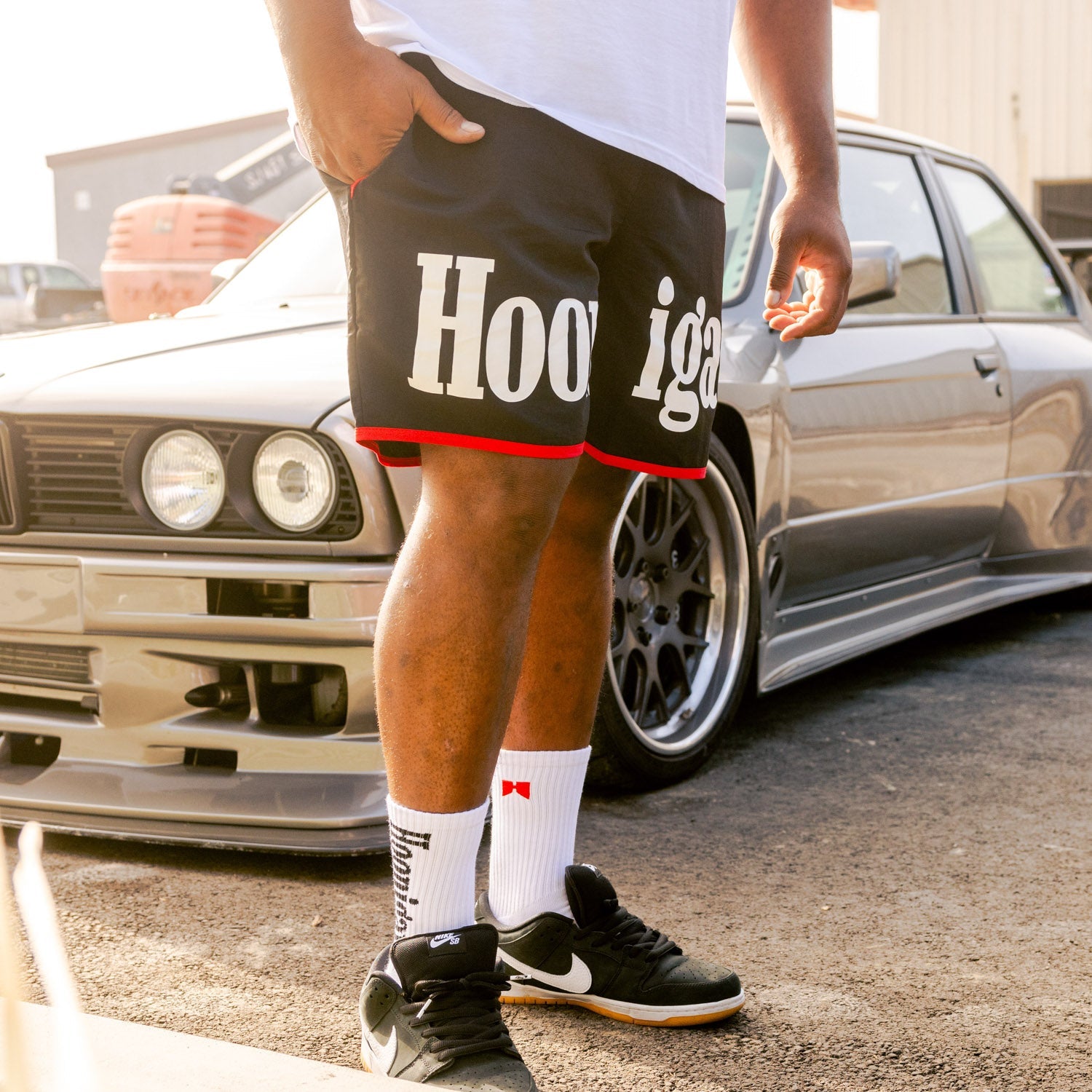 Hoonigan Surgeon General Nylon Shorts in black with white logo, featuring a drawstring waistband and side pockets.