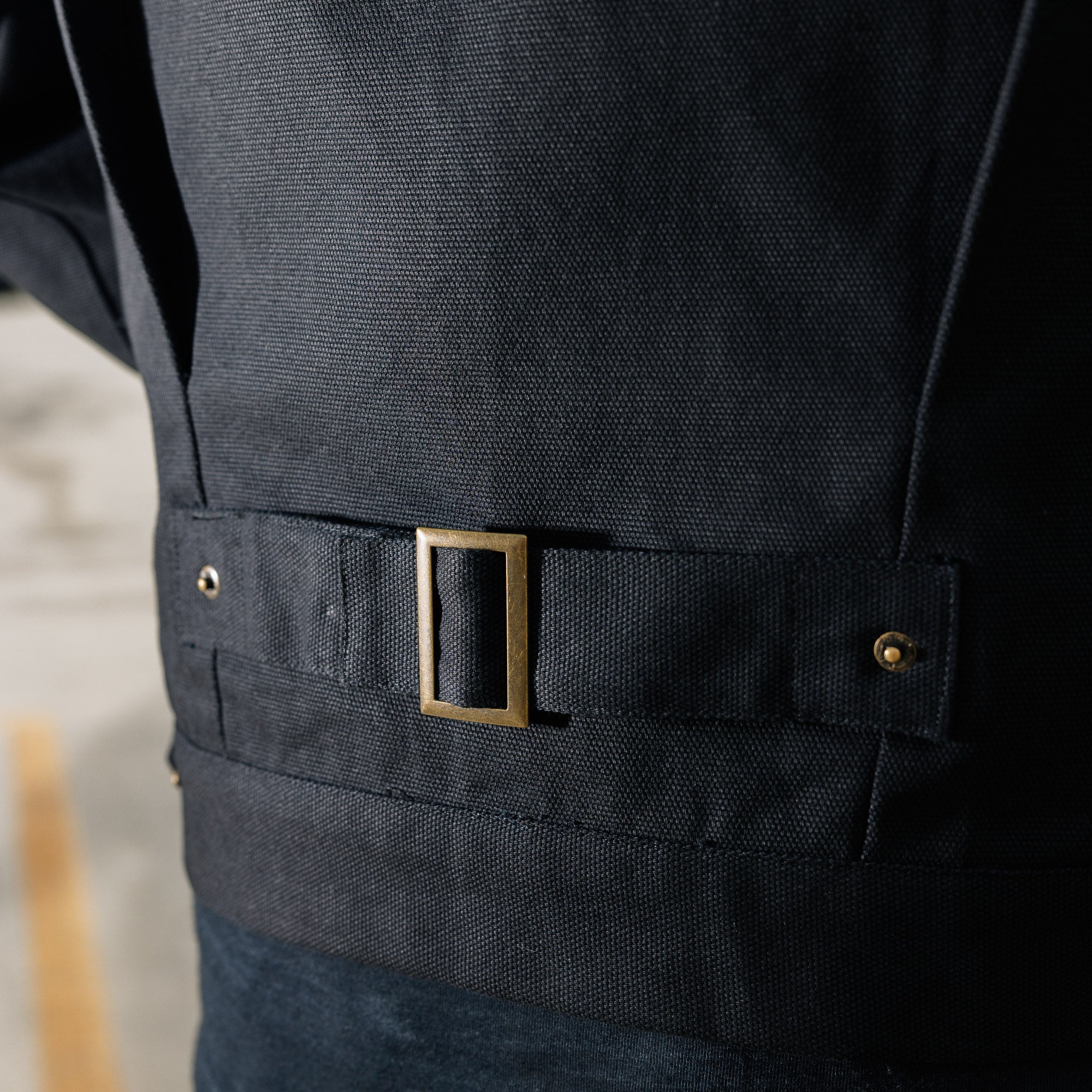 Hoonigan KNUCKLEBUSTERS jacket featuring a black and white design, logo detailing on the chest, and a relaxed fit.