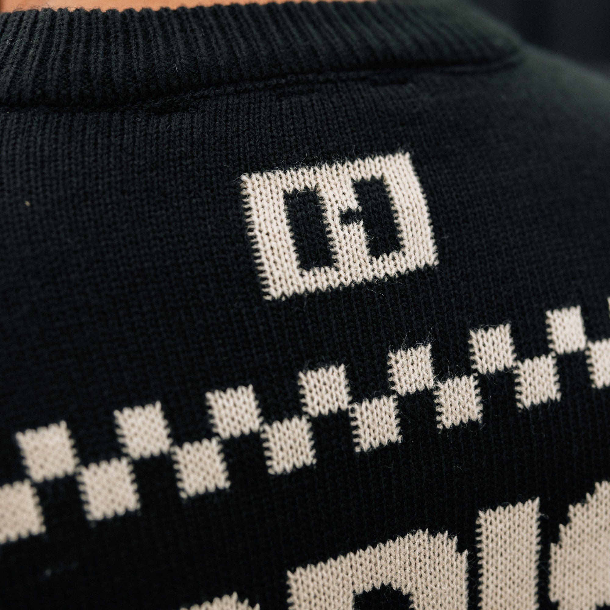 Hoonigan TIRE SLAYER Ugly Christmas Pullover featuring a bold graphic design and festive colors, perfect for holiday parties.