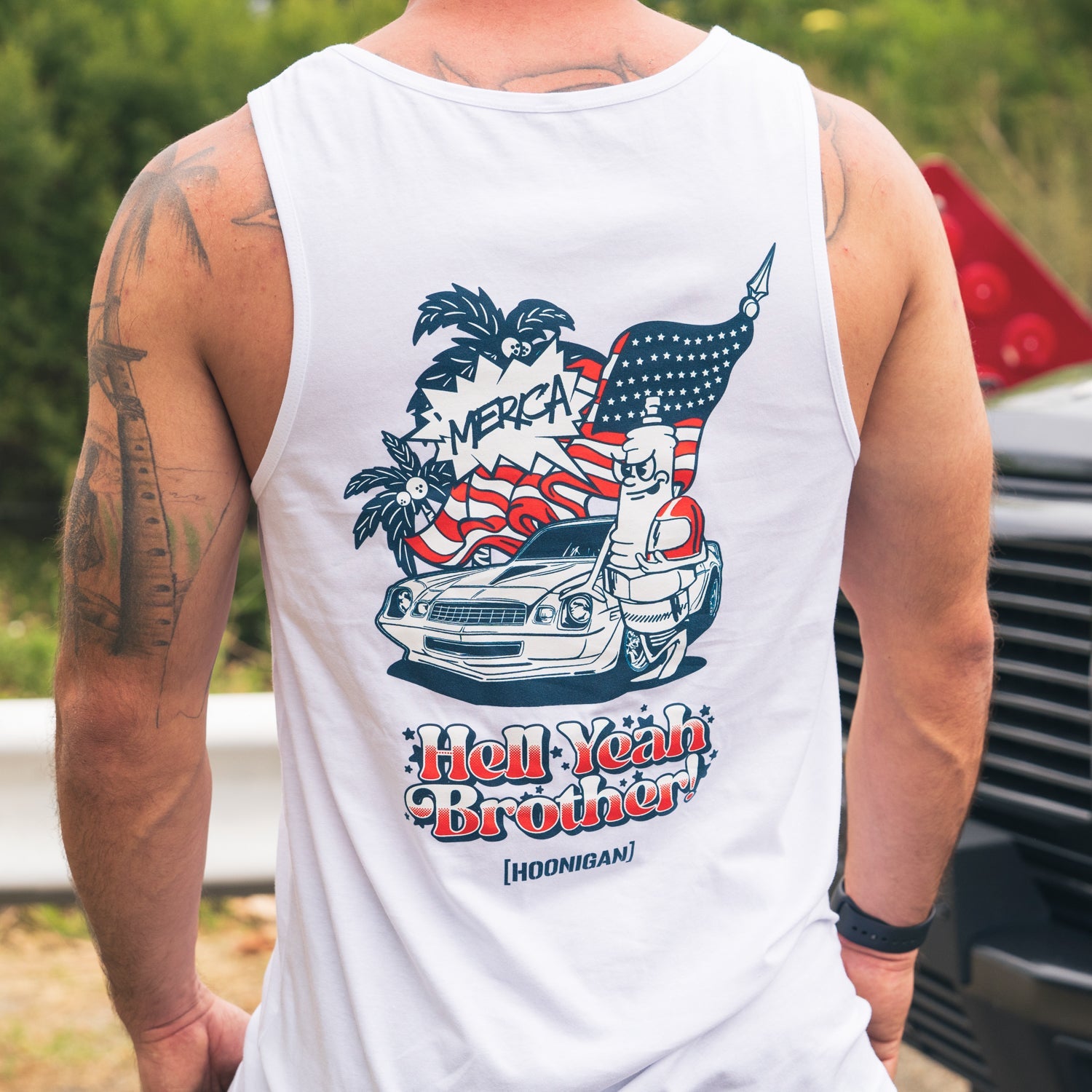 Hoonigan 'MERICA Tank Top featuring a bold American flag graphic on a black background.
