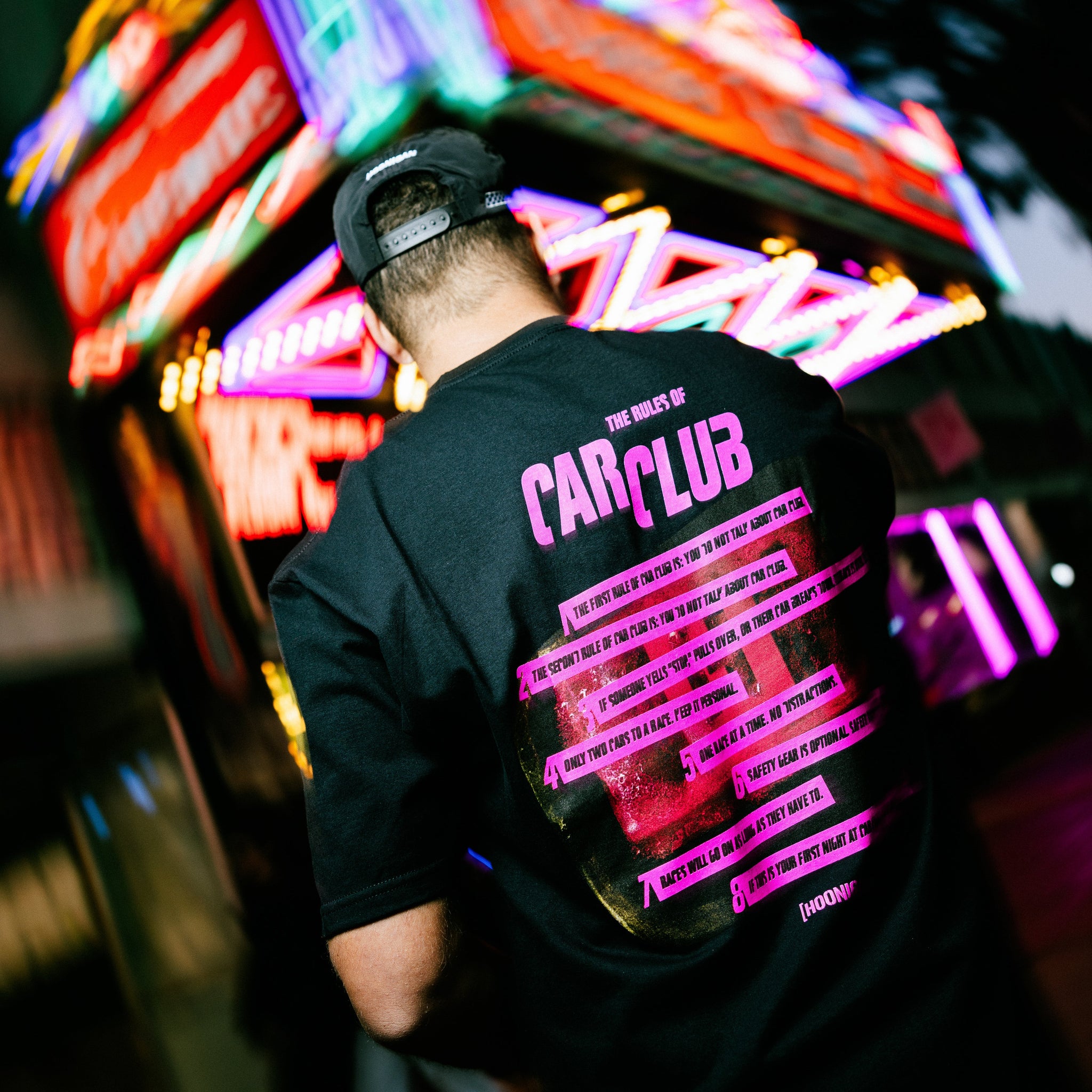 Hoonigan CAR CLUB short sleeve tee in black, featuring a bold car-themed graphic on the front.