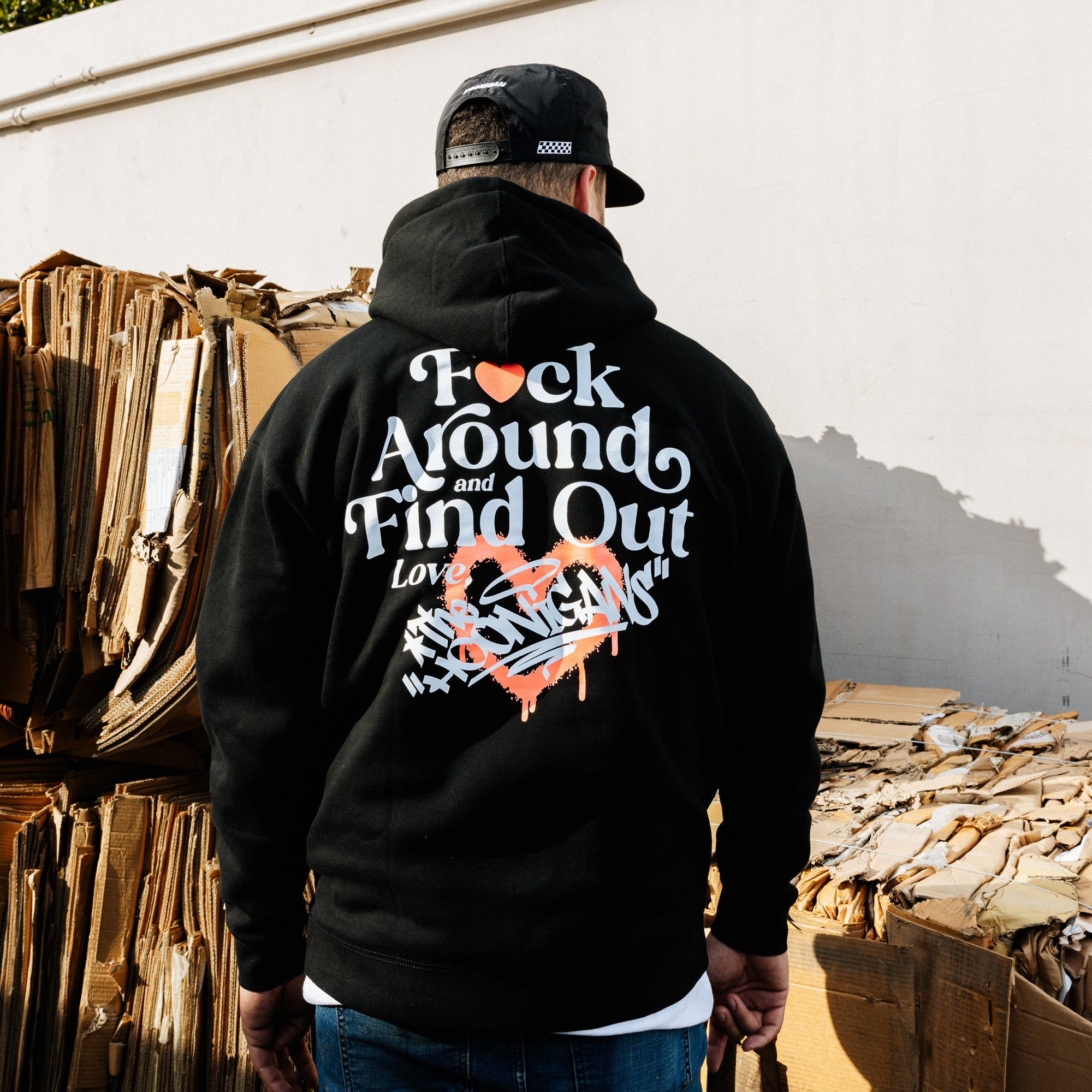 Hoonigan FIND OUT Pullover Hoodie in black with white logo and graphic design.