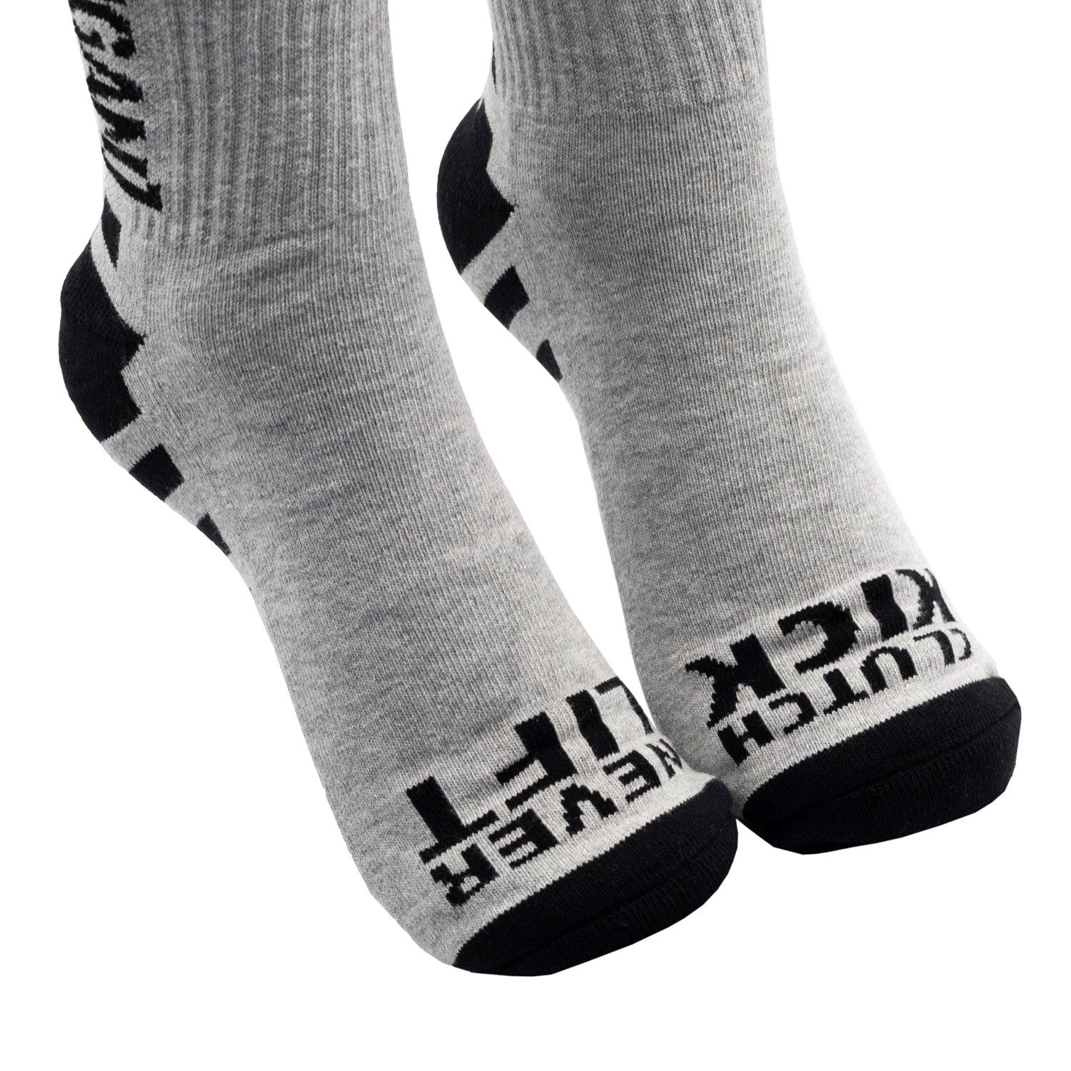 Hoonigan NEVER LIFT socks featuring a black and white design with bold logos and graphics.