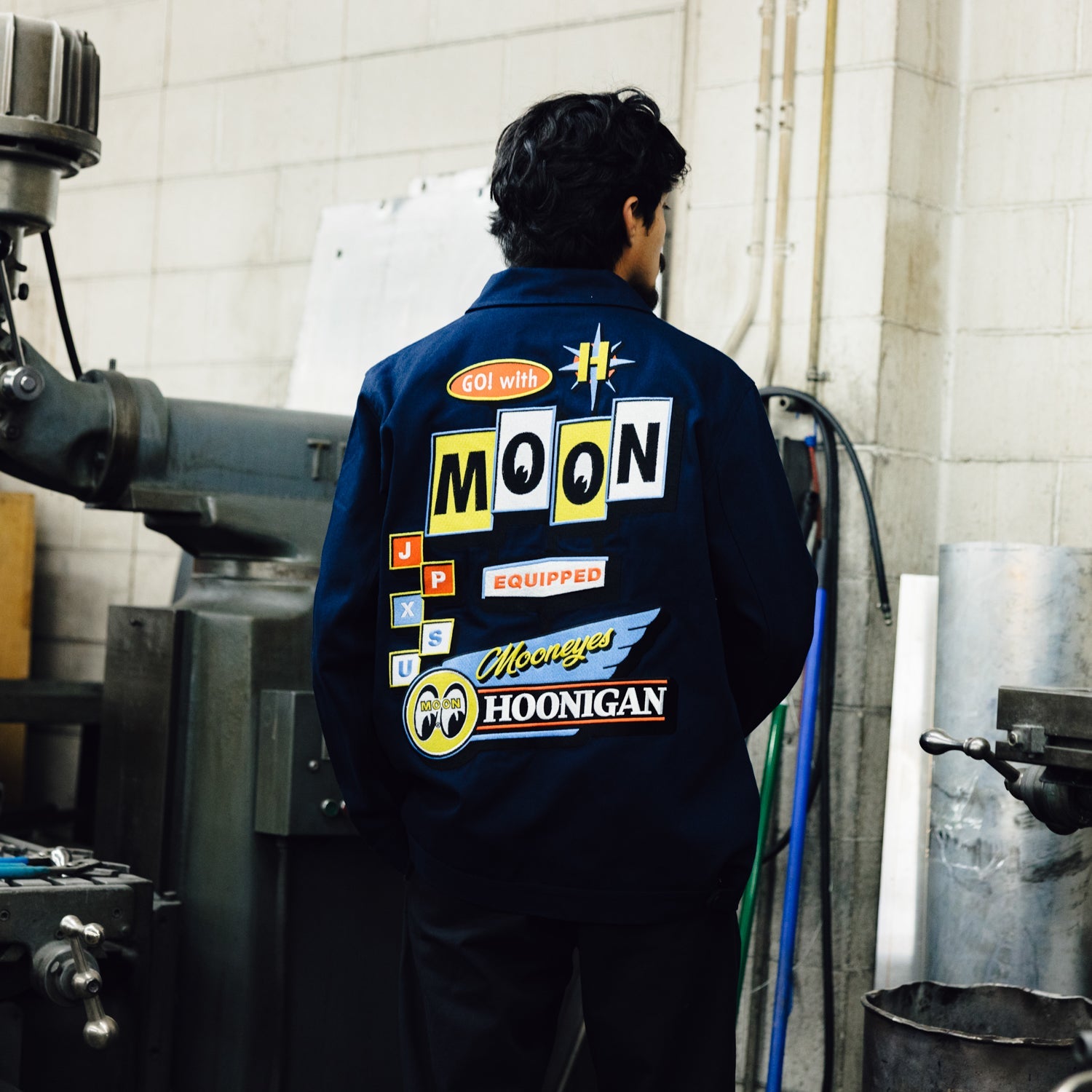 Hoonigan x Mooneyes MOON MOTEL Jacket featuring a black design with bold graphic prints and a relaxed fit.