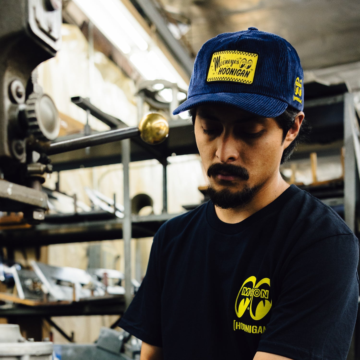 Hoonigan x Mooneyes MOONIGANS unstructured strapback hat, featuring a black design with white logo embroidery.