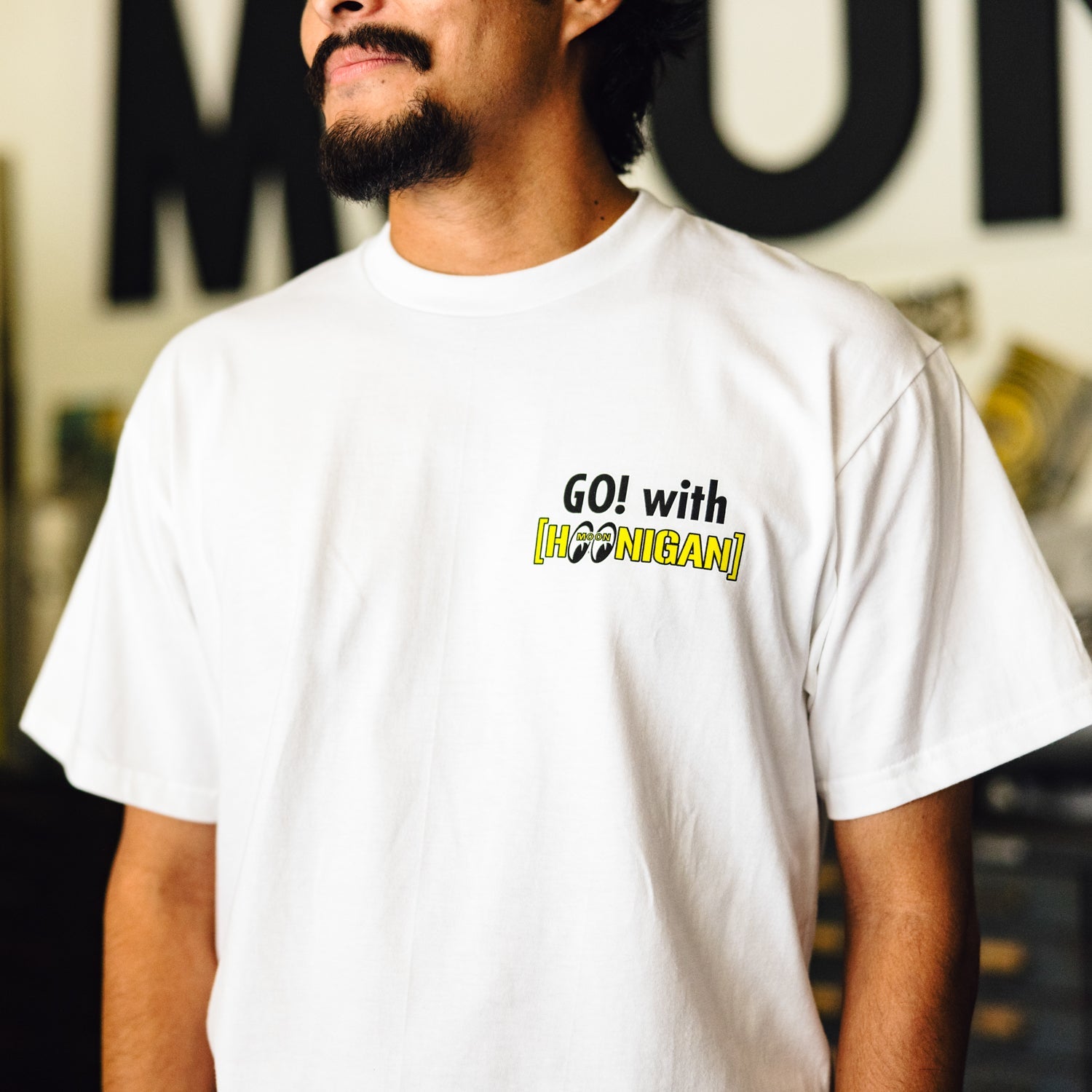 Hoonigan x Mooneyes short sleeve tee featuring bold "HOON AND MOON" graphic print on the front.