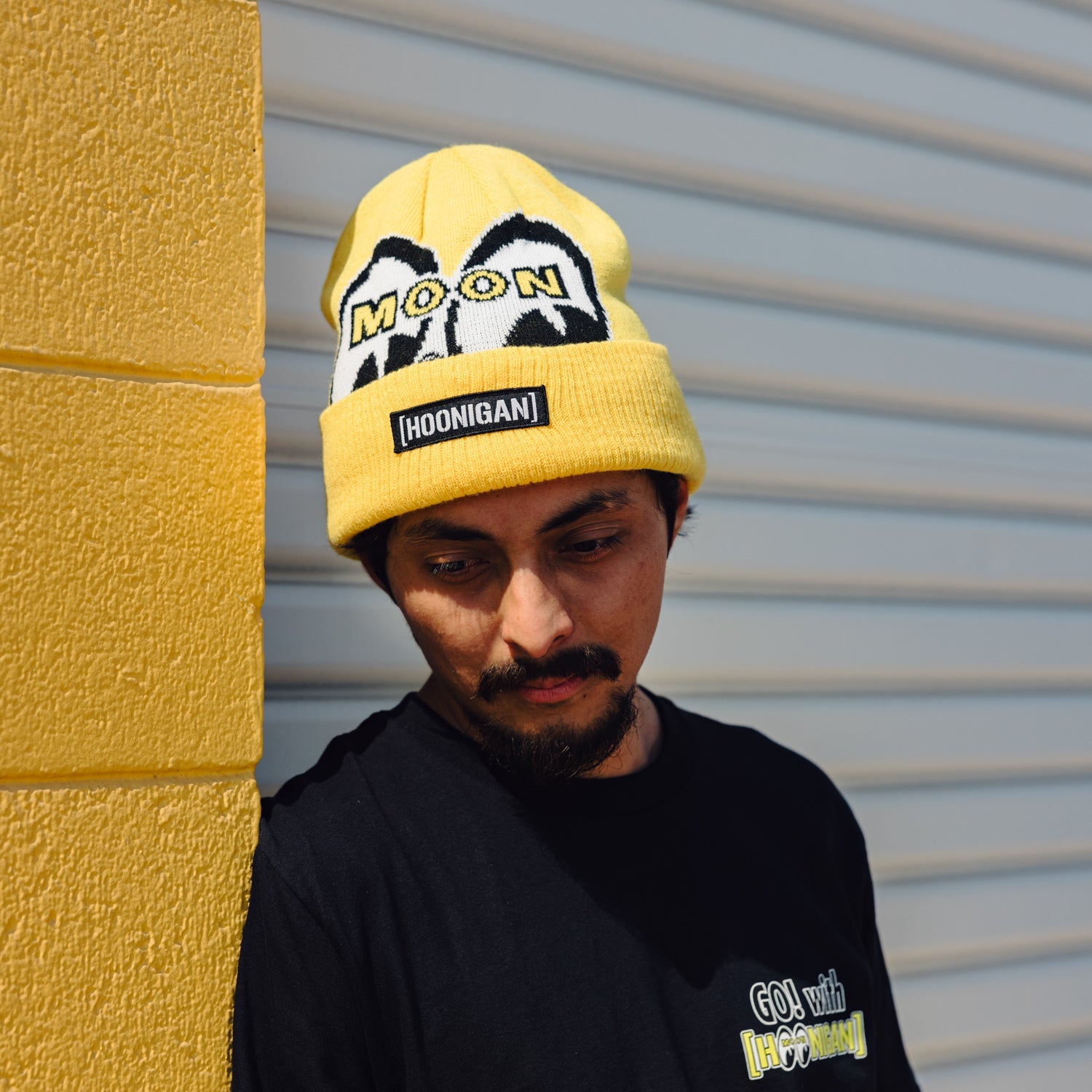 Hoonigan x Mooneyes LQQK Beanie in black with a white logo on the front.