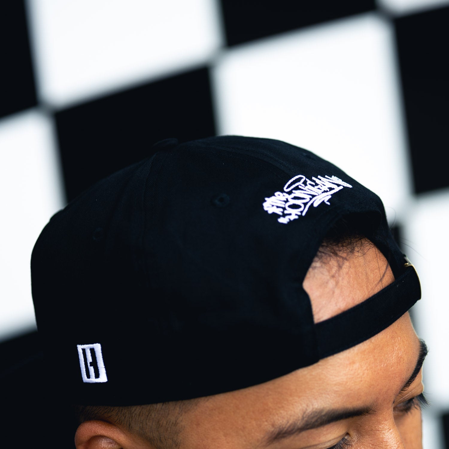 Hoonigan FIND OUT unstructured strapback hat in black with embroidered logo.