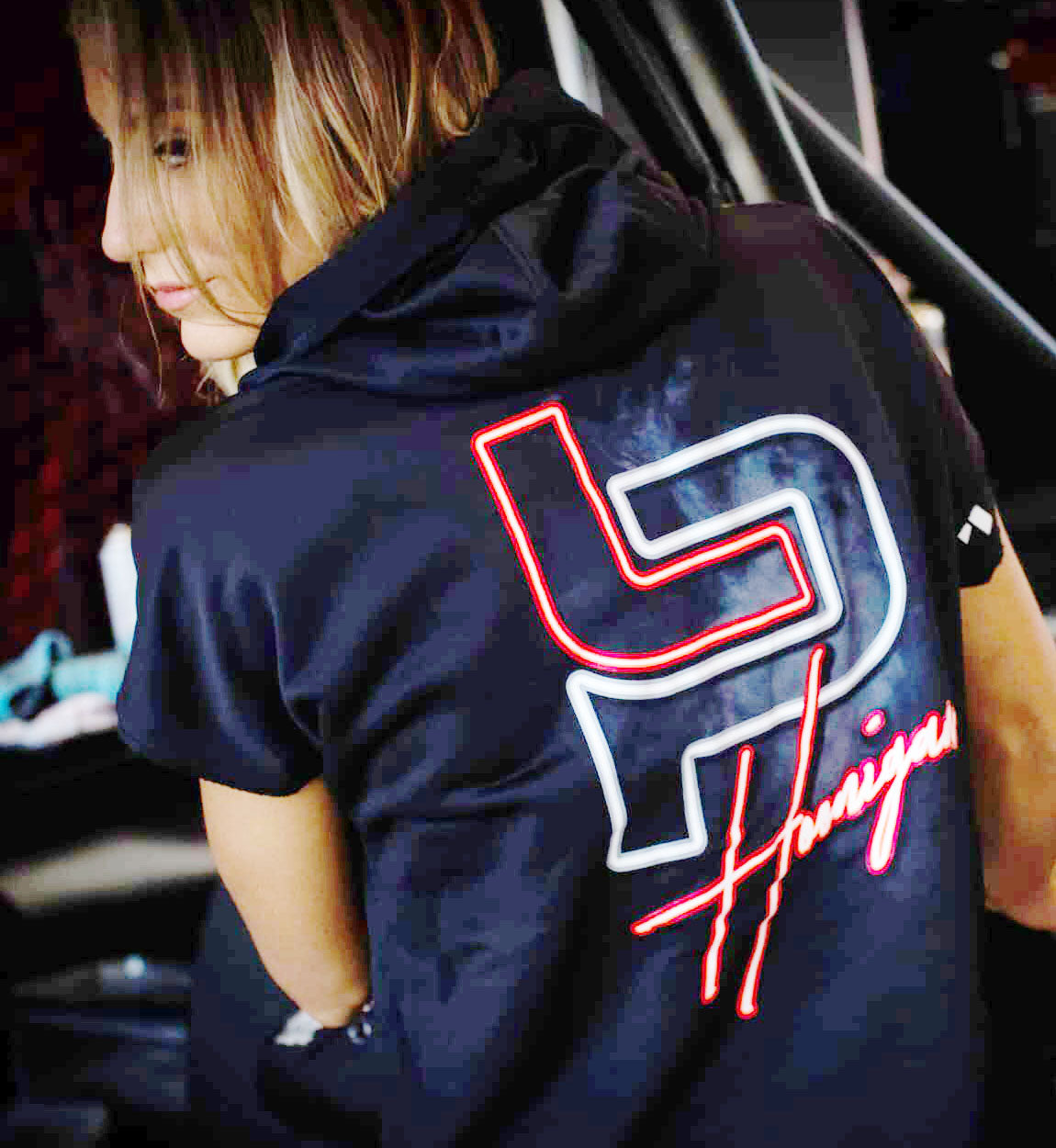 Hoonigan Women's Leah Pruett LP Energy short sleeve pullover hoodie in black, featuring a relaxed fit and logo detailing.