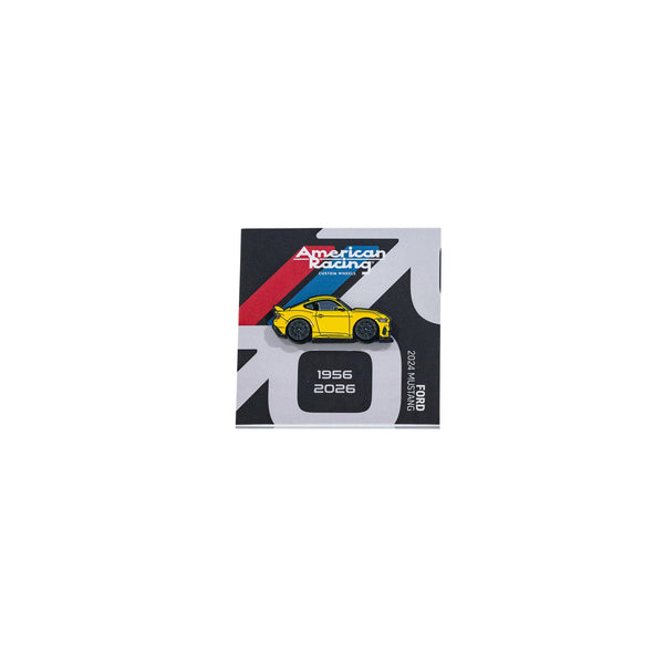 American Racing Mustang Leen Customs pin featuring a yellow Mustang design, celebrating the model's legacy from 1956 to 2026.