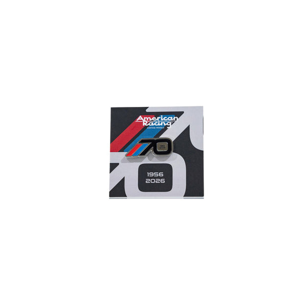 American Racing 70th Leen Customs Pin featuring a sleek design with the years 1956 and 2026 on a stylish background.