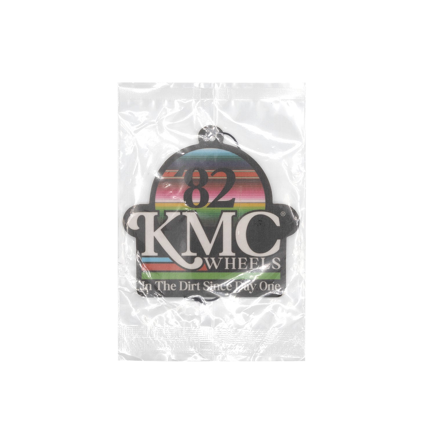 KMC NATIVES Air Freshener in a sleek black bottle with a minimalist design, featuring a label showcasing the brand name and vibrant scent options, set against a white background.