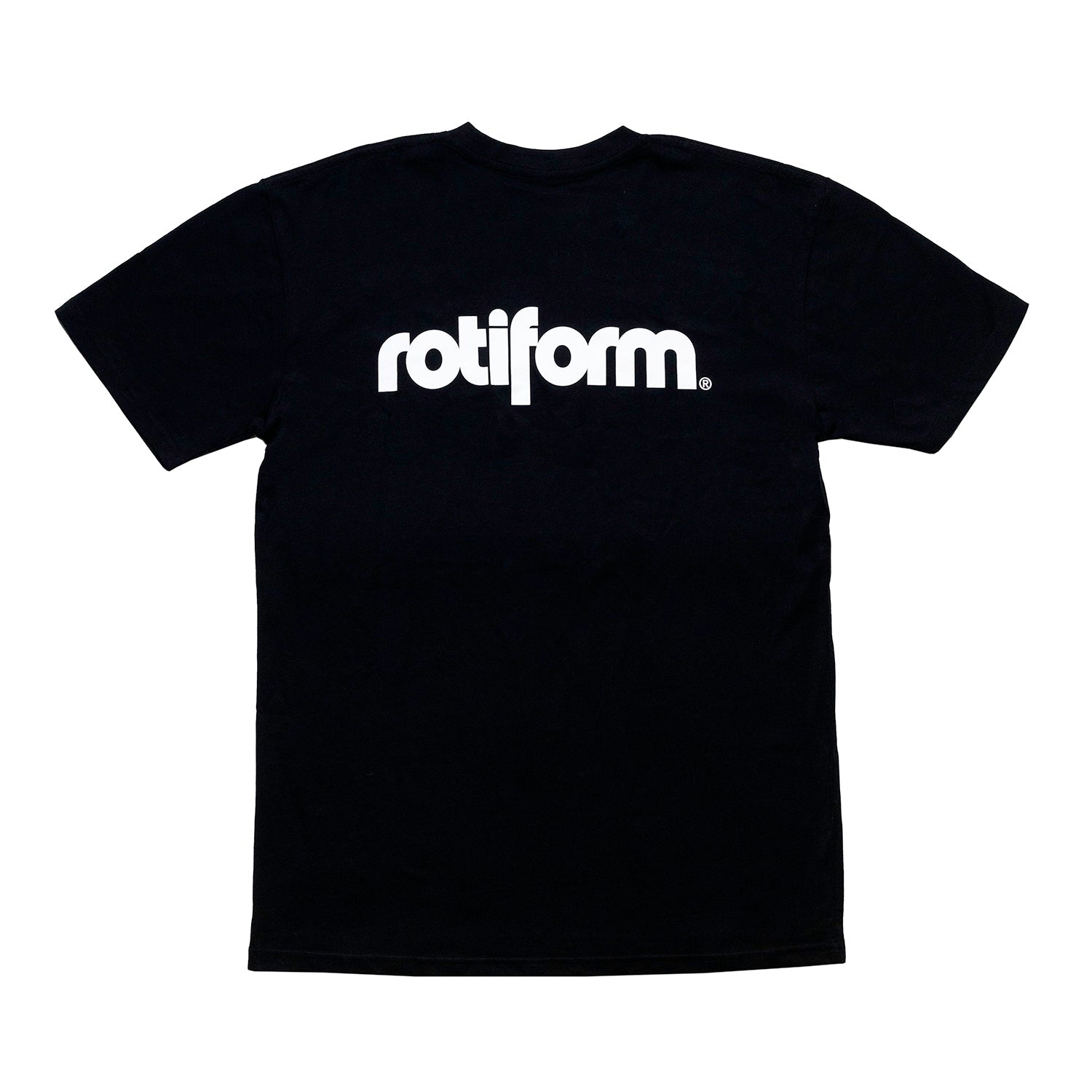 Rotiform STAPLE Short Sleeve Tee in black with a bold graphic logo on the front, featured against a studio backdrop.