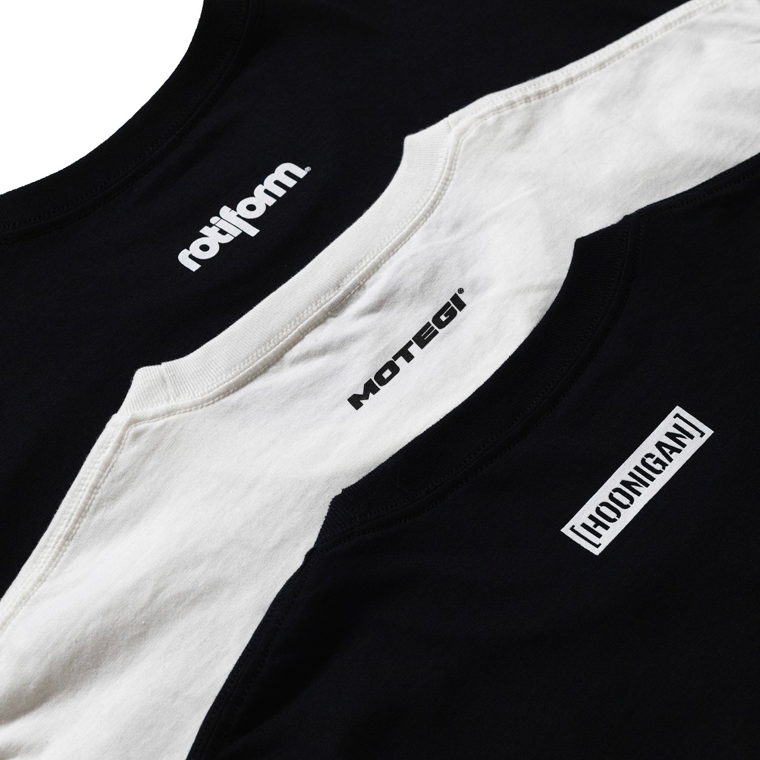 Rotiform SD Series Short Sleeve Tee in black, featuring a bold graphic logo on the front and a comfortable fit.