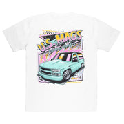 White short sleeve t-shirt featuring a vibrant graphic of a custom teal truck with "U.S. MAGS CUSTOM WHEELS" text on the back.
