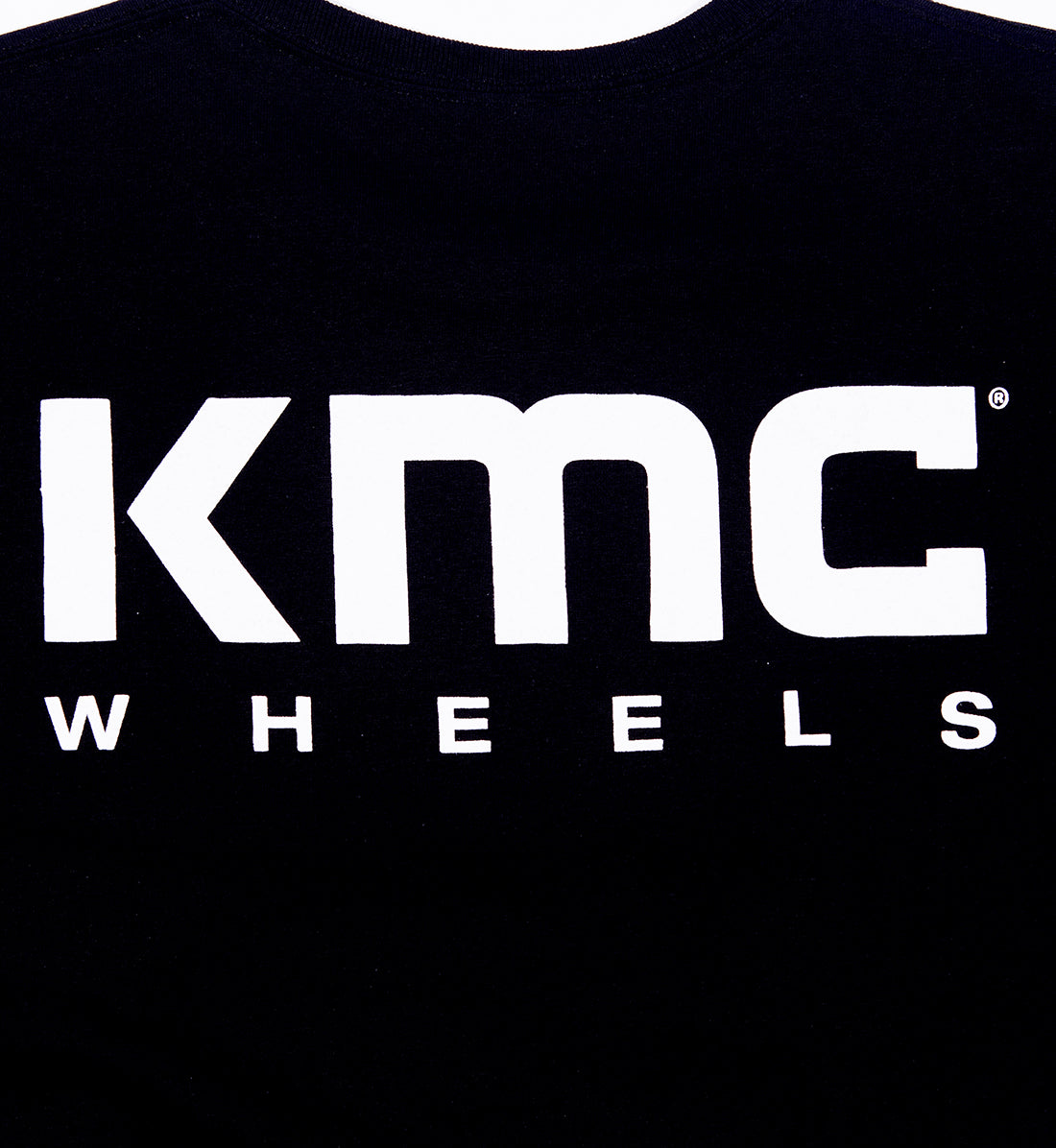 KMC women's short sleeve tee featuring a logo design, displayed in black.