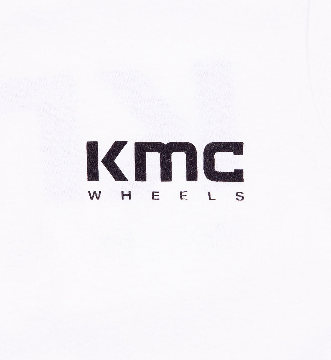 KMC logo women's short sleeve white tee, front view showcasing logo detail.