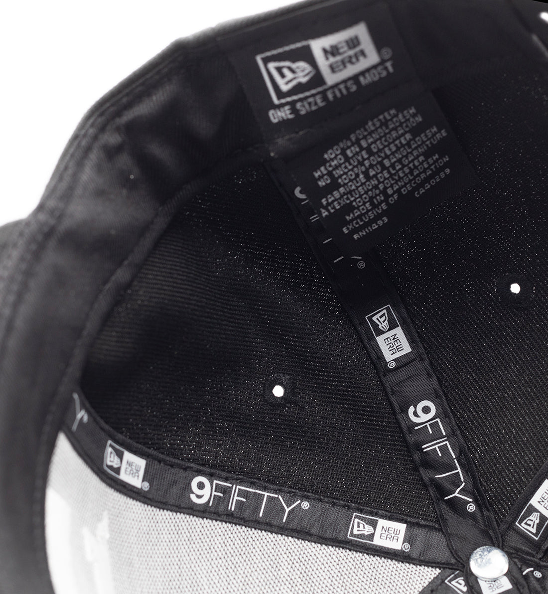 KMC BLANKET Snapback Hat in black with a flat brim and adjustable strap, featuring a textured blanket pattern.